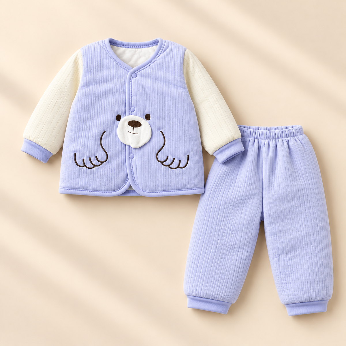 Blue bear top and trousers